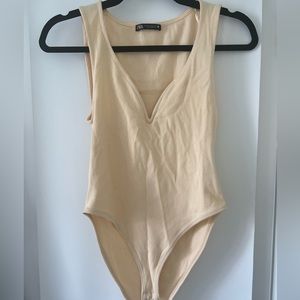 ZARA pale yellow v-neck ribbed bodysuit